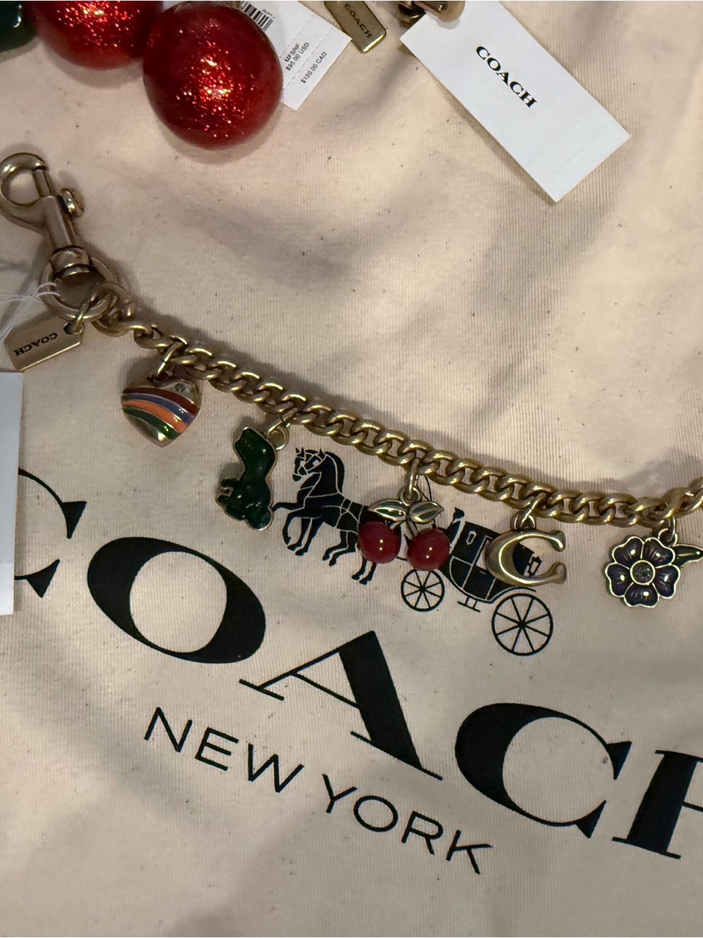 Coach Gold-Tone Charm Bracelet with Multicolor Enamel Heart and Green Charm